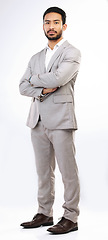 Image showing Serious, business man and portrait of arms crossed in studio, white background and leadership. Focused male model, entrepreneur and professional corporate worker with pride, power and suit of boss