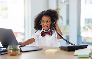 Image showing Little girl, telephone and laptop in call center working or playing pretend as a sales consultant at office. Happy kid on phone call talking at consulting desk for imagination, dream job or career