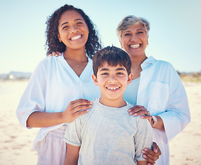 Image showing Portrait of mom, grandma and child at beach, smile and happy family bonding together on ocean vacation. Sun, fun and happiness for mother, senior woman and kid in Cancun on summer holiday in Mexico.