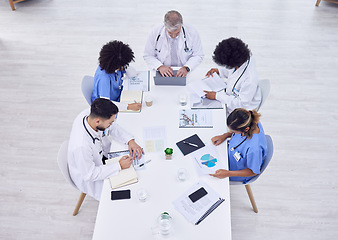 Image showing Doctors, nurses or hospital meeting on laptop for research, teamwork or workshop innovation of medicine. Medical planning, men or healthcare diversity women on technology collaboration in top view