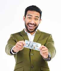 Image showing Money, cash and excited business man on studio background for investment, bonus and stock market. Finance success, winner and isolated happy male with bills for winning, profit and wealth savings