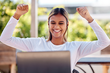 Image showing Winner, laptop and cheering with a freelance woman remote working from a cafe on her small business startup. Wow, motivation or celebration with an attractive young female entrepreneur at work online