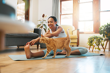 Image showing Cat, fitness or happy woman in yoga stretching legs for body flexibility, wellness or healthy lifestyle. Kitten, pet animal or zen girl in exercise, workout or training warm up in house exercising