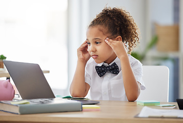 Image showing Stress, laptop and child boss in the office while reading information on the internet for project. Corporate cosplay, frustration and young girl kid ceo working on a report with computer in workplace