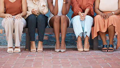 Image showing Legs, interview and business women waiting in line for their meeting with human resources during recruitment. Feet, hiring and candidate with a group of people sitting in a row at an agency for hr