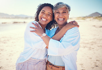 Image showing Portrait, family and mother with adult daughter hug, happy and bond at beach together, smile and relax. Love, parent and girl embrace, travel and excited for ocean trip, holiday and freedom in Miami