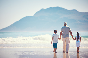 Image showing Holding hands, relax and grandfather with children at beach for holiday, bonding and vacation mockup. Affectionate, travel and happiness with old man and kids walking for summer break, fun or support
