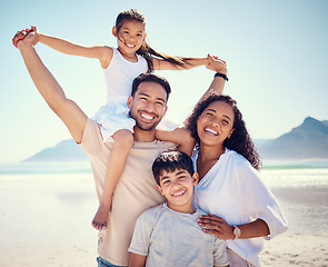 Image showing Beach, family and portrait of parents with kids, smile and happy bonding together on ocean vacation. Sun, fun and happiness for hispanic man, woman and children on summer holiday adventure in Mexico.