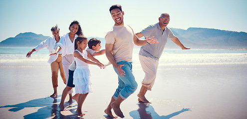 Image showing Beach, family playing and running together on holiday, generations walking on ocean sand. Fun, vacation and happy men, women and kids bonding, quality time and summer adventure in nature in Mexico.