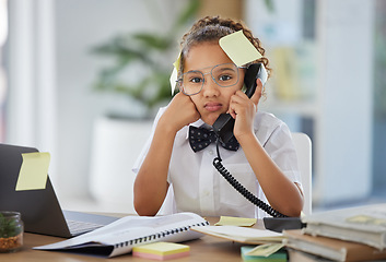 Image showing Phone call, boss and child by a desk in the office with sticky notes and a stress, annoyed and upset face. Frustration, landline and girl kid ceo on a telephone while working in a modern workplace.