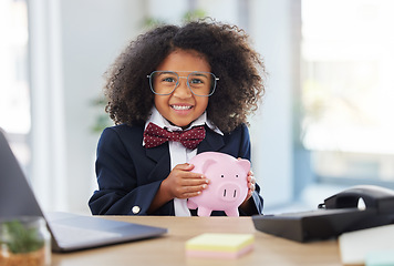 Image showing Child, office portrait and piggy bank for saving, finance or investment with smile for playing. Young girl, happiness and bank for future, money and trading at desk in workplace with excited face