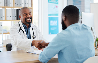 Image showing Happy doctor, patient and handshake in healthcare for checkup, consultation or agreement at hospital. Black man, medical professional shaking hands with client for consulting, visit or appointment