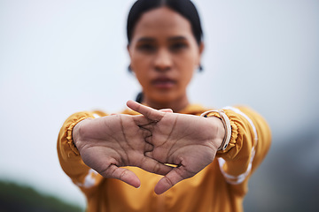 Image showing Woman, hands and runner, fitness with stretching and outdoor running in nature. Exercise, cardio and palm, serious female and warm up for run, training for race or marathon and active lifestyle