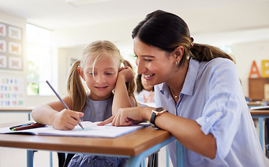 Image showing Teacher, learning and helping girl in classroom for drawing, studying or assessment. Teaching, development and kid or student with happy woman for education assistance with notebook in kindergarten.