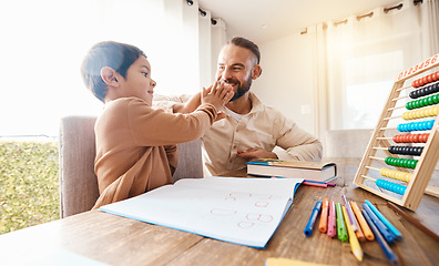 Image showing Happy, education and father high five with child to celebrate after studying alphabet, homework help or homeschool. Family success, learning or boy with dad in gesture for development or achievement