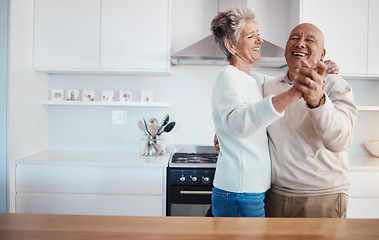 Image showing Love, retirement and dancing, old couple in kitchen at home, weekend time and celebrate romance with smile. Dance, happiness and bonding, happy man and senior woman having fun in house or apartment.