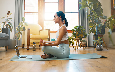 Image showing Yoga, fitness meditation and woman on laptop for online class and workout with home, holistic health and wellness. Biracial person in lotus pose, meditate and training tutorial, streaming on computer