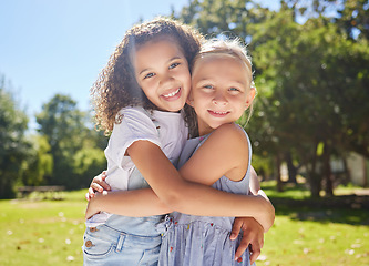 Image showing Summer camp, portrait or happy children hugging in park together for fun, bonding or playing in outdoors. Fun girls, diversity or young best friends smiling or embracing on school holidays outside