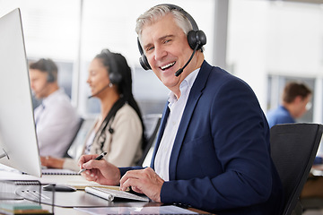 Image showing Portrait, laughing and man in call center in office working on customer service in workplace. Telemarketing, mature person and funny sales agent, consultant and telemarketer writing information.