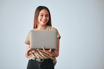 Image showing Portrait, smile and woman with laptop in studio isolated on a white background mockup. Social media, computer and happiness of person with pc for online browsing, web scrolling or typing on backdrop.