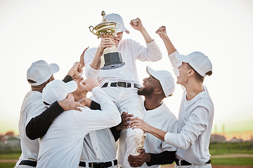 Image showing Baseball player, trophy and men winning competition, game or sports goals, success and victory award. Happy group of people or winner celebration, fist pump and achievement congratulations together