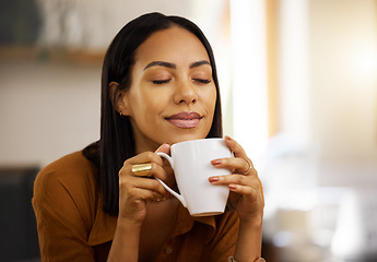 Image showing Happy smile, coffee and woman at home in a kitchen with a hot drink feeling relax and calm in the morning. Happiness, zen and young female in a house holding tea and mug in a household with mockup