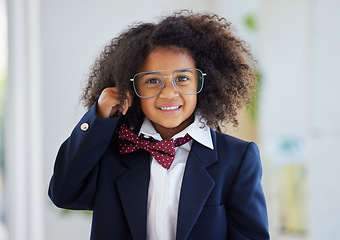 Image showing Happy, portrait and a child dressed as an employee, playing in the office and having fun with work clothes. Smile, playful and a little girl wearing a suit to play pretend as a business person