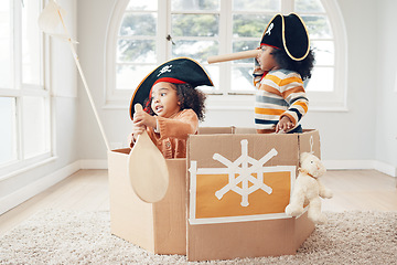 Image showing Playing, box boat and pirate children role play, fantasy imagine or pretend in cardboard container. Telescope, fun home game or sailing black kids on Halloween cruise adventure with yacht captain