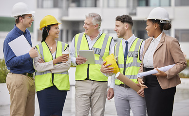 Image showing Construction site, team and meeting at a building for planning, creative and collaboration. Architecture, business people and designer group with blueprint, documents and engineering development plan