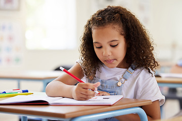 Image showing Learning, drawing and girl in classroom for education, exam or studying with book. Preschool, creativity development and serious kid or student coloring for art in notebook in kindergarten or academy