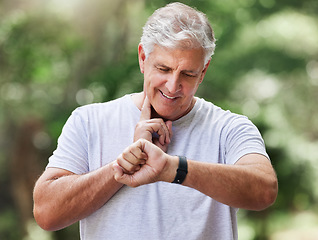 Image showing Senior man, watch and pulse outdoor for a exercise, workout and training on road for fitness. Elderly male person with hand on neck for cardio progress or health and wellness while running in summer