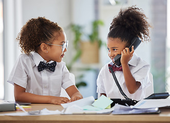 Image showing Talking, telephone and kid boss in the office while working on a project together with teamwork. Collaboration, landline and girl children ceo in business people cosplay or costume in a workplace.