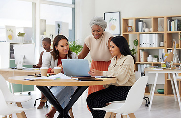 Image showing Business women, laptop and diversity collaboration of a web analytics group in a office. Teamwork, solidarity and online logistics of female staff in a meeting with website statistics and data