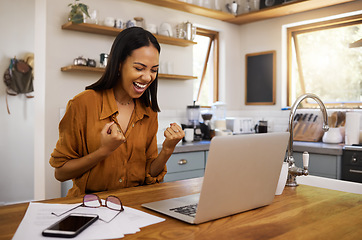 Image showing Laptop, success and business woman celebrating finance, savings and investment growth in a kitchen. Online, victory and freelance female excited for good news, loan and startup approval in her home