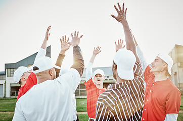 Image showing Hands up, motivation or baseball people in huddle with support, hope or faith on sports field in game together. Teamwork, happy people or group of excited softball athletes with goals or solidarity