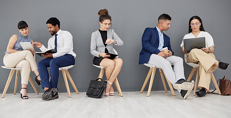 Image showing Talking, waiting and business people with tech in office, checking the time and planning. Meeting, team and corporate employees busy getting ready for an interview, networking and helping with work