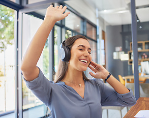 Image showing Headphones, music and happy business woman dance in office, smile and excited while having fun. Podcast, radio and dancing female corporate employee relax with audio playlist, track or song at work