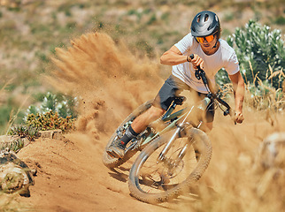 Image showing Cycling, trail and sports with man on mountain bike for adventure, fitness and adrenaline junkie. Exercise, risk and fast with male athlete riding in nature for workout, training and action speed