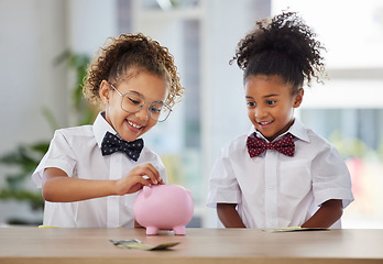 Image showing Happy, saving and girls with money for a piggybank, investing coins and excited while playing. Budget, smile and little children with cash for investment, safe keeping and learning to save together