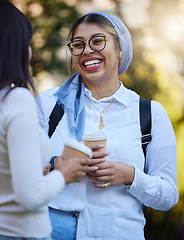 Image showing Laughing, break or university friends at park on campus for learning, education or goals together. Funny girls Muslim or students relaxing with school books meeting for research or college knowledge