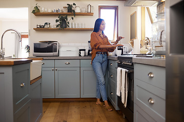 Image showing Kitchen, thinking and woman prepare coffee for breakfast latte, cappuccino and hot beverage at home. Relaxation, calm morning and thoughtful girl make espresso, caffeine drink and brewing for peace