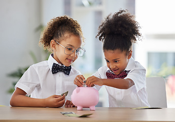 Image showing Kids, saving and piggy bank budget of girl friends playing pretend office accountant workers. Financial planning, learning and children with cash and money deposit profit into safe with happiness