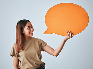 Image showing Speech bubble, smile and woman with mockup in studio isolated on a white background. Social media, poster and happy girl with billboard for voice, opinion or branding, marketing or advertising space.