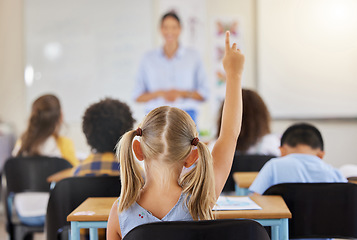 Image showing Education, back and a child raising hand in class for a question, answer or vote at school. Teaching, academic and a student asking a teacher questions while learning, volunteering or voting