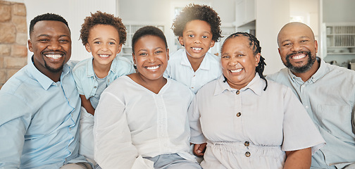 Image showing Happy, bonding and portrait of a black family on a sofa for happiness, visit or quality time. Smile, group and African parents, children and grandparents on a couch for generations in the lounge