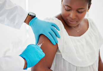 Image showing Doctor, hands and patient arm injection for covid vaccination, booster shot or immunity at hospital. Hand of a medical professional holding client arms for needle prick, vaccine or treatment for cure