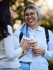 Image showing Happy, break or students talking at park on university campus for learning, education or goals together. Girls talk, Islamic or students relaxing with coffee meeting for research or college knowledge