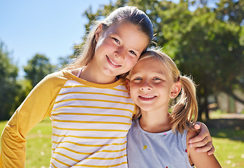 Image showing Portrait, children and hug with friends in a park together for fun, bonding or playing in summer. Hugging, kids and love with girl best friends embracing in a garden in the day during school holidays