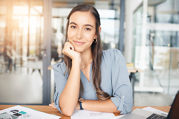 Image showing Woman designer, portrait and smile at desk in office for paperwork, pride or expert engineering in Canada. Happy young female architect at desk with confidence of planning strategy in startup company