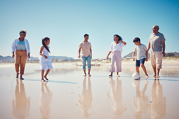 Image showing Family soccer, beach holiday and kids running by the sea with happiness and freedom. Football, young girl and parents walking by ocean in summer on vacation with children on the sand with a smile